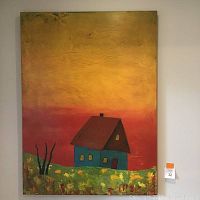 Full view of the painting showing the blue house with a brown roof on a textured green-yellow grassy field with a bright orange-yellow sky.