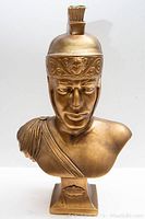 Front view showing detailed face, helmet crest, and minor chip on top of helmet