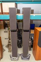 Two Beovox Penta speakers front view, showing full height and fabric grills