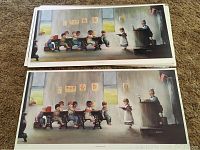 Stack of multiple 'School Days' prints showing a classroom scene with children and a teacher, laid flat on carpet.