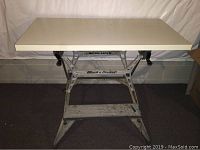 Front view of Black & Decker Workmate with additional cream-colored top attached