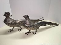 Two silverplate pheasant figurines, front and side view showing details, size and condition.