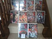 Photo showing Marvel Civil War II comic books #0, 1, 2, 3, plus additional issues including #6, #7, #8 arranged on stairs.