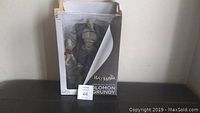 Solomon Grundy action figure in original Batman Arkham box, box window open and front displaying character name