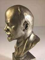 Side profile showing texture and detail of Lenin bust.