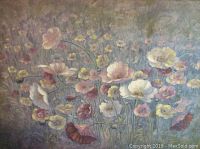 Framed floral picture featuring delicate, pastel-colored flowers in a textured artistic style.