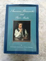 Front cover of the book showing title and image of silversmith painting.