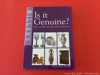 Front cover of the hardcover book 'Miller's Is It Genuine? How to Collect Antiques with Confidence' showing title, editor, and images of antiques.