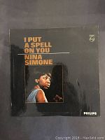 Front of the album cover showing title and artist name with a portrait photo of Nina Simone.
