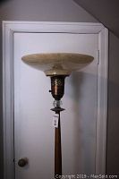 Side/angled view of the lamp highlighting height and shape.