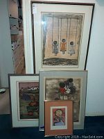 Four framed prints by G. Rodol Boulanger, stacked; view of all pieces