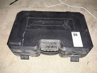 Closed Michelin branded hard plastic case containing emergency roadside kit items.