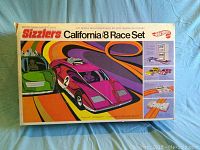 Box showing colorful Hot Wheels Sizzlers California 8 Race Set with racing cars and looped track illustration.