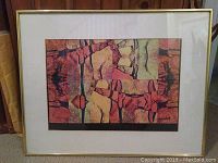 Framed abstract mixed media artwork in earth tones with cracked texture design.