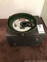 Overall front view of the Johnson-Pacific safe showing the combination dial, keyhole, and steel structure.