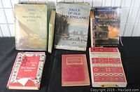 Eight books focused on New England history and culture laid out, showing front covers and some spines; includes Tales of the New England Coast, Tales of Old New England, and others.