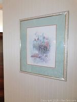 Framed watercolour artwork hanging on wall, shows overall piece including matting and frame