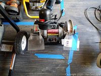 Front view of the Craftsman variable speed grinder showing overall condition and grinding wheels.