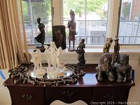 Overview of entire lot on table and windowsill