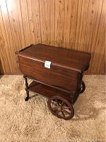 Full view of the wooden serving cart with closed leaves showing its dimensions per the seller's description.