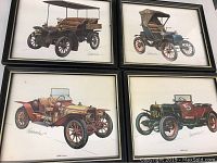 Four framed old car illustrations in a grid layout, each about 11x9 inches