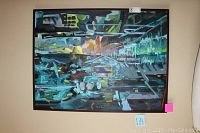 Full view of framed abstract painting on beige wall