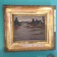 Front view of framed painting showing Georgian Bay landscape and gilt frame