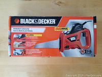 Box of Black & Decker Gel Max powered handsaw with branding and product features visible.
