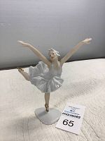 Front view of the Wallendorf ballerina figurine showing detailed face, arms outstretched, and white ruffled tutu.
