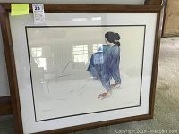 Overall view of the framed pencil signed print showing wood frame, white mat and full artwork.
