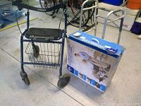 Photo showing blue walker with padded seat and basket under seat beside the boxed Medline transport chair.