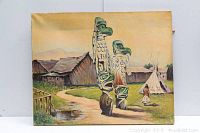 Front view of the painting showing the full village scene with totem poles and huts