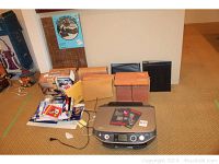 Overview photo showing Edson Stylus Photo RX580 printer with items around including accordion files, notebooks, and paper.