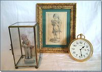 Photo of the chalk drawing in ornate frame, brass Seiko desk clock, and porcelain boy figurine in glass display case showing lot contents