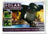 Box front showing the product name Style-Line Solar 2 in 1 Floodlight 2 pack and main product image.