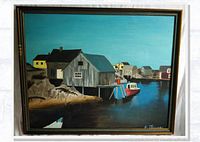 Full view of framed coastal acrylic painting showing buildings, boats, and water.