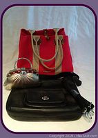 Three purses shown: silver clutch, fuchsia tote handbag, and black leather purse
