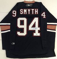 Back view of navy blue Edmonton Oilers jersey showing SMYTH nameplate and #94