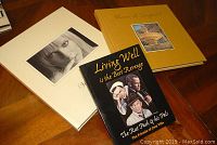 Photo showing all three books laid on a wooden table, two hardcovers titled Vintage Vegas Golden Nugget and one paperback Rat Pack book.