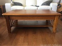 Front view of wooden coffee table in room