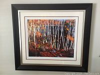 Front view of framed print 'In The Northland' by Tom Thomson