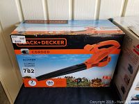 Box front showing Black & Decker branding, model number 782, specifications including 7 amps and 180 MPH airflow.