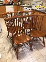 Four chairs arranged in kitchen showing overall set