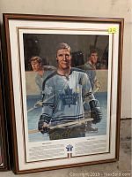 Full view of framed Tim Horton hockey print showing overall appearance and condition