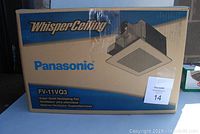 Box front showing Panasonic WhisperCeiling FV-11VQ3 super quiet ventilating fan.