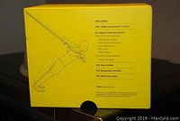 Box back panel showing contents included with the TRX Home Suspension Trainer kit.