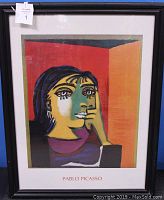 Full view of the framed print showing Picasso's cubist portrait and frame condition