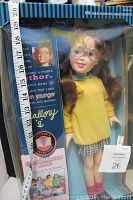 Front view of boxed Mallory doll from The Baby-Sitters Club, showing doll and accessories inside box with size measured around 19 inches tall