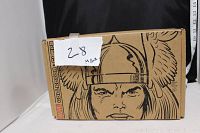 Front side of Marvel Avengers mystery blind box showing detailed black line art illustration of Thor wearing winged helmet. Box is sealed and shows some wear.