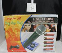 Front view of the product box showing DigiJet Hard Drive Karaoke Microphone with key features and images of people singing